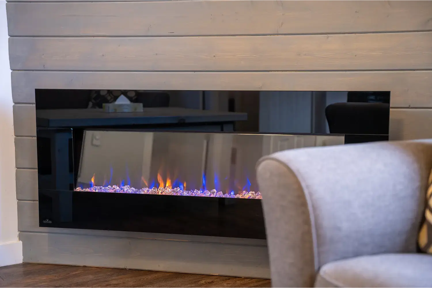 Cozy fireplace inside a Manning Park Resort Standard Cabin, adding rustic charm and comfort.