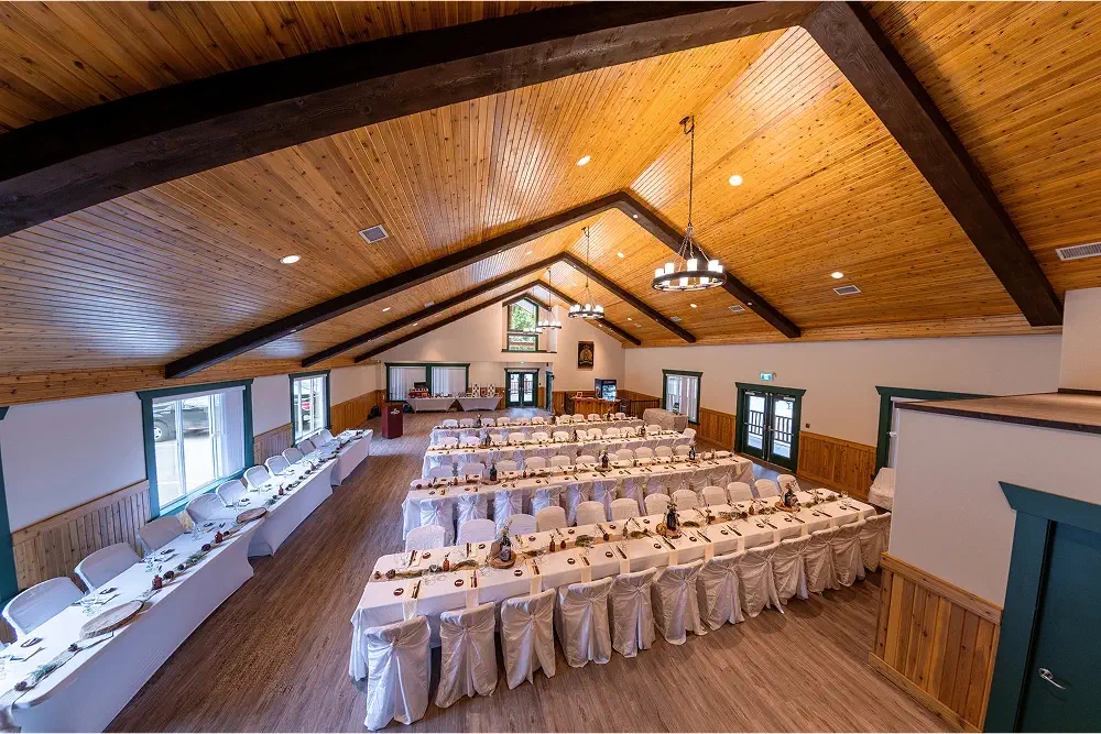 Overhead view of the Alpine Room set up with multiple tables for a wedding at Manning Park Resort.