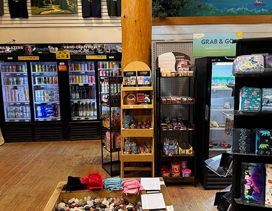 Shelves stocked with various products inside the Manning Park Resort Country Store.